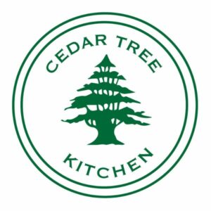 Logo for Cedar Tree Kitchen including silhouette of cedar tree in green with block letters above and below the tree. Entire design is set inside two circles in dark green color.